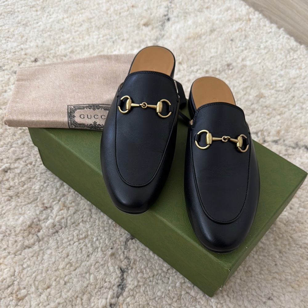 Gucci Black Leather Mules with Gold Accents